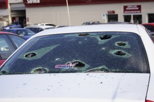 windscreen-punctured-by-hailstones